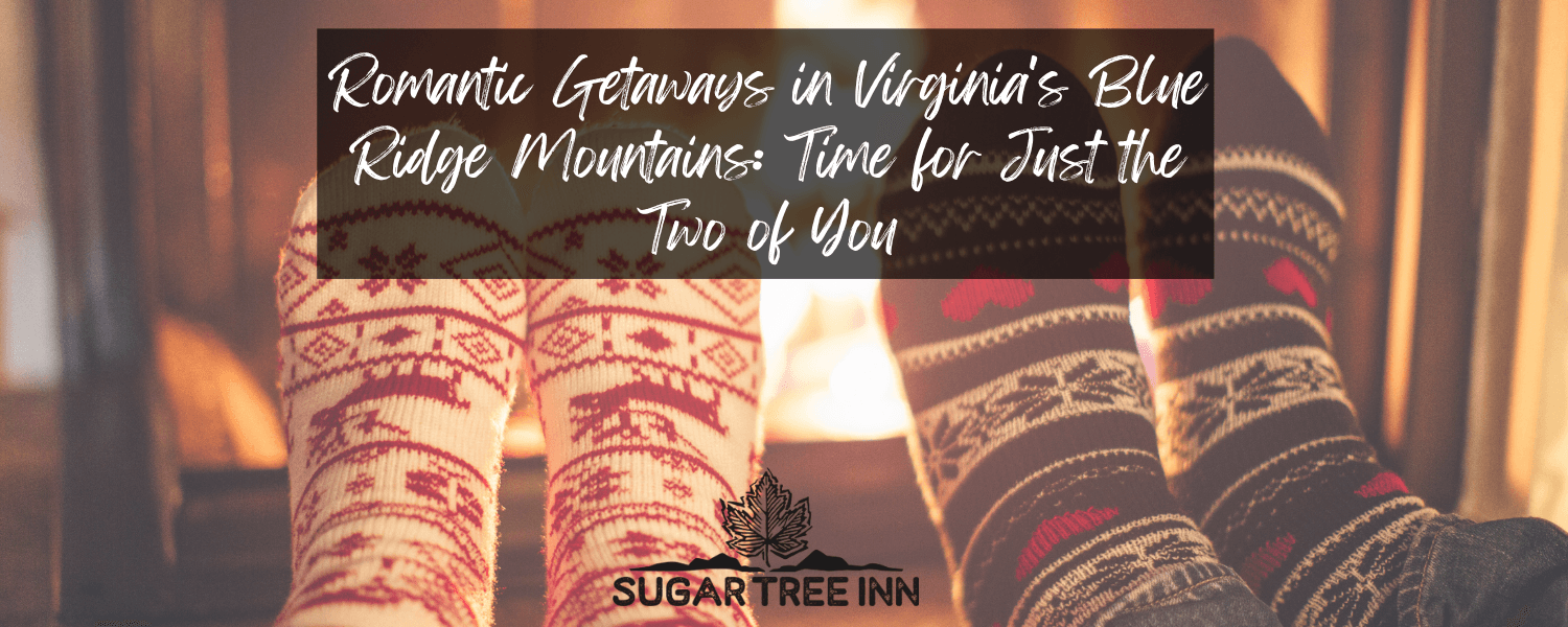 Text overlay on a cozy image of two pairs of festive socks in front of a fireplace, promoting romantic getaways in the Blue Ridge Mountains.