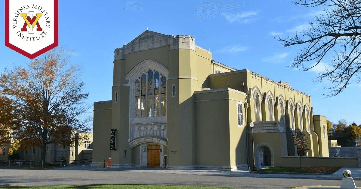 Exterior view of Virginia Military Institute's building with autumn foliage.
