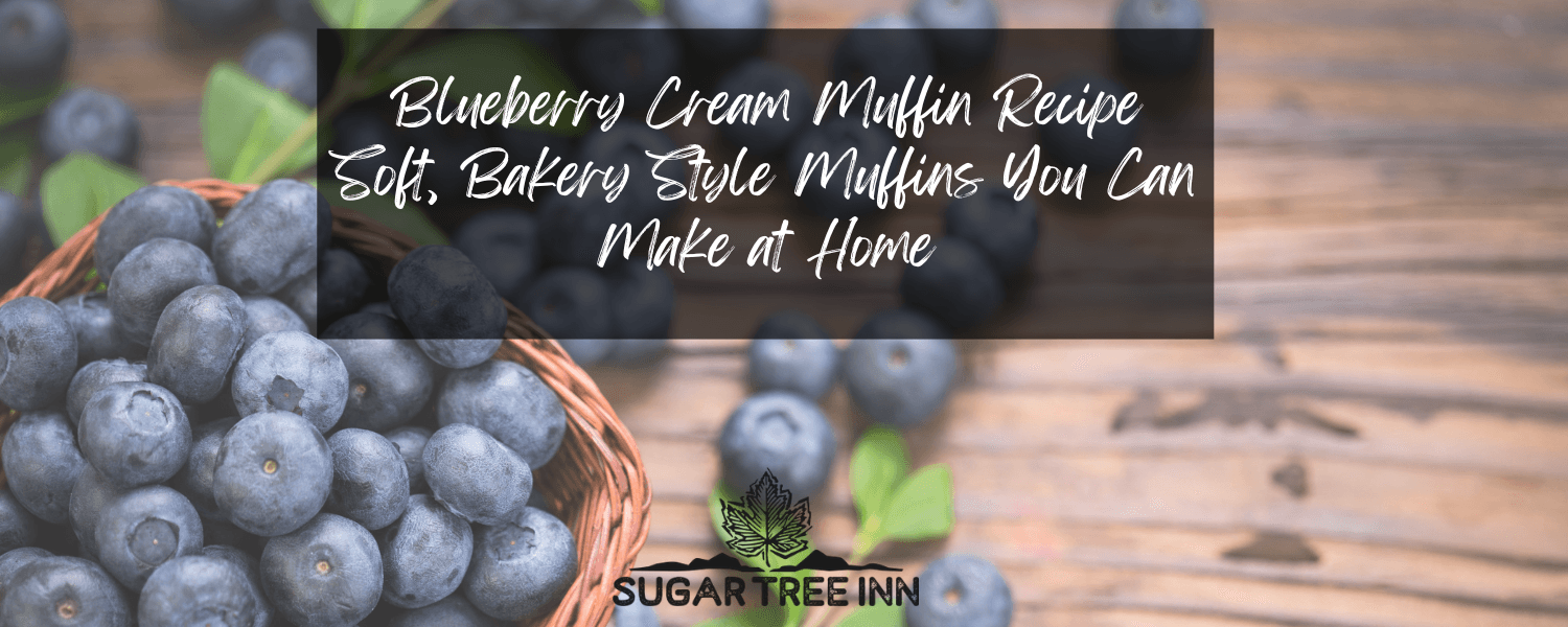A basket of fresh blueberries with the text "Blueberry Cream Muffin Recipe" overlaying a wooden surface. A basket of fresh blueberries with the text "Blueberry Cream Muffin Recipe" overlaying a wooden surface.