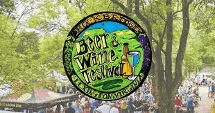 people walking around tents set up with rockbridge bear and wine festival logo