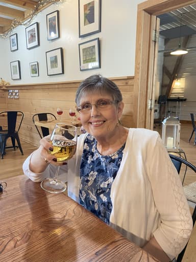Donna drinking a glass of wine at Rockbridge